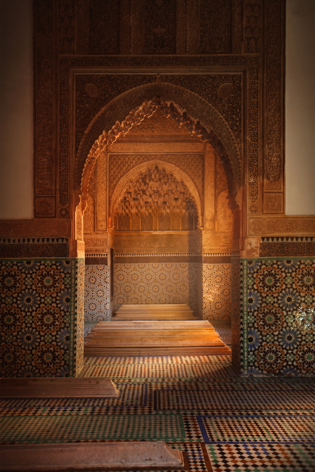 Ornate arches in tiled room, Marrakech, Morocco