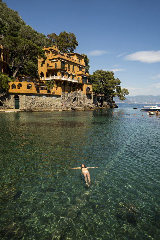 A woman floating on her back