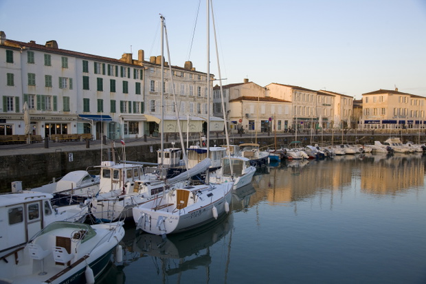 Moored sailboats on waterfront, St. Martin, Ile de Re, France