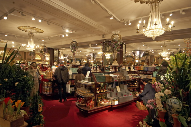 An interior view of Fortnum and Mason's food hall on the Piccadilly, London. This department store feels like it has never changed over the years, with its fountains, golden cherubs, and outlandish displays throughout the store. The store which is most fa