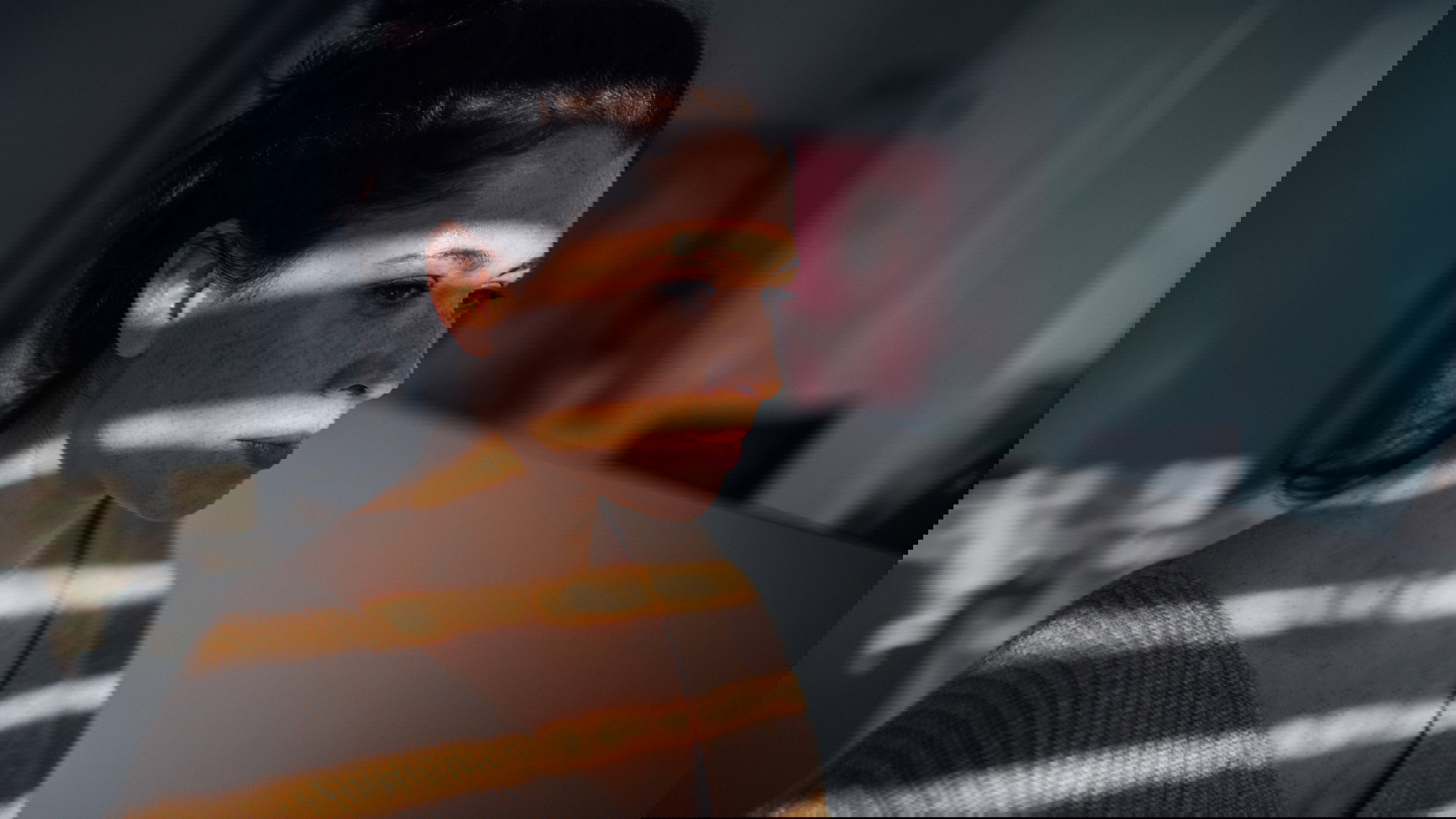 Portrait of young woman in her apartment