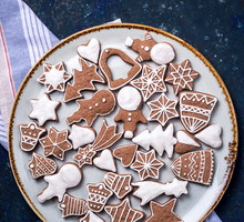 High Angle View Of Gingerbread Cookies In Plate On Marble