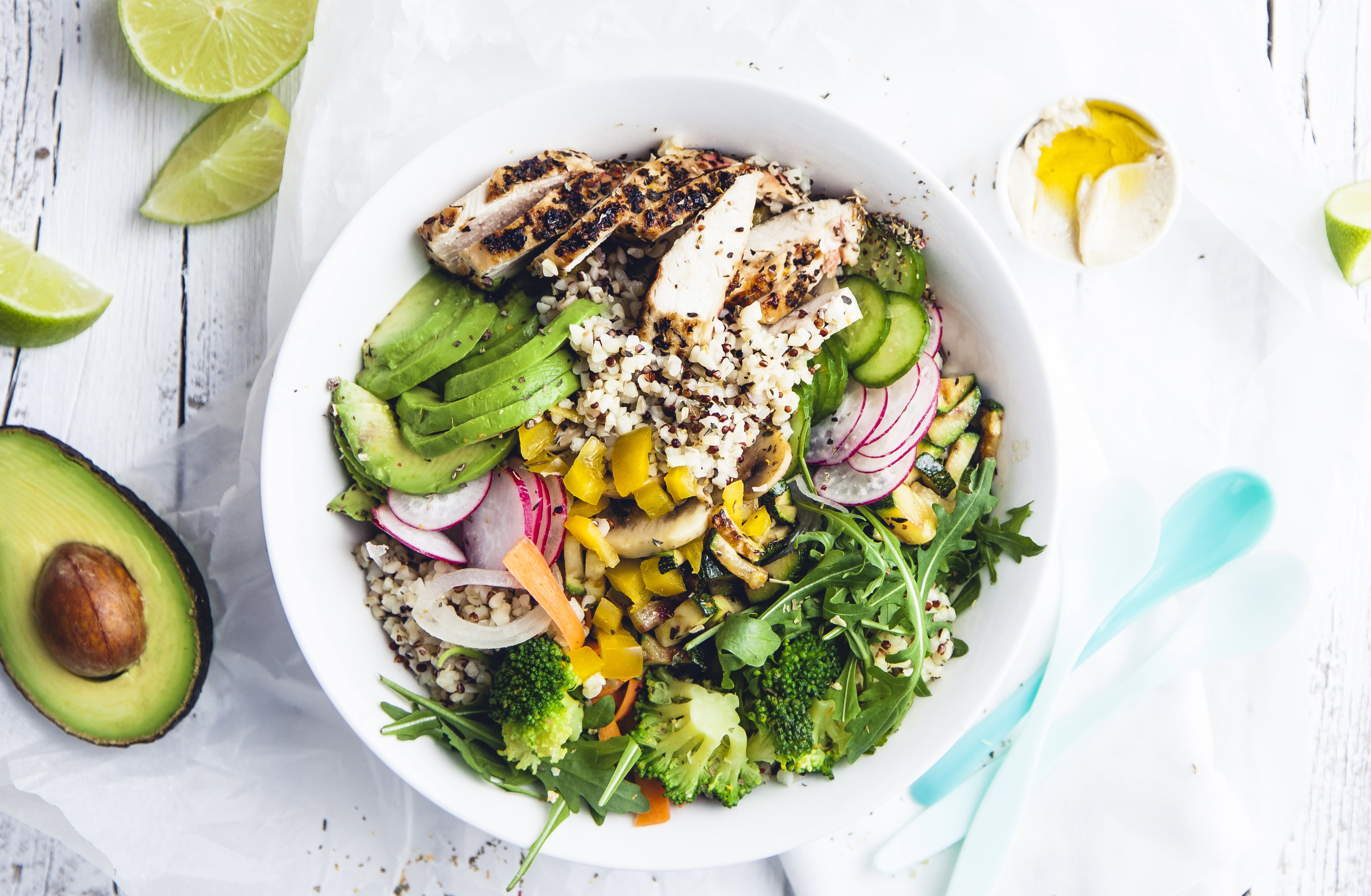 fresh Healthy Quinoa Bulgur bowl with vegetables and chicken