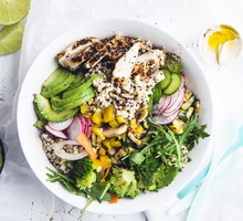 fresh Healthy Quinoa Bulgur bowl with vegetables and chicken