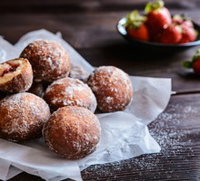 Bomboloni - Italian doughnuts stuffed with strawberry jam