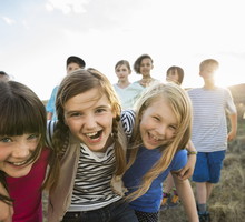 Group portrait of kids having fun outdoors