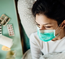 Infected woman with mask in mobile quarantine hospital units isolation.Coronavirus patient having pneumonia disease symptoms.Health care.Attacked immune system.Medical help.Recovery from virus