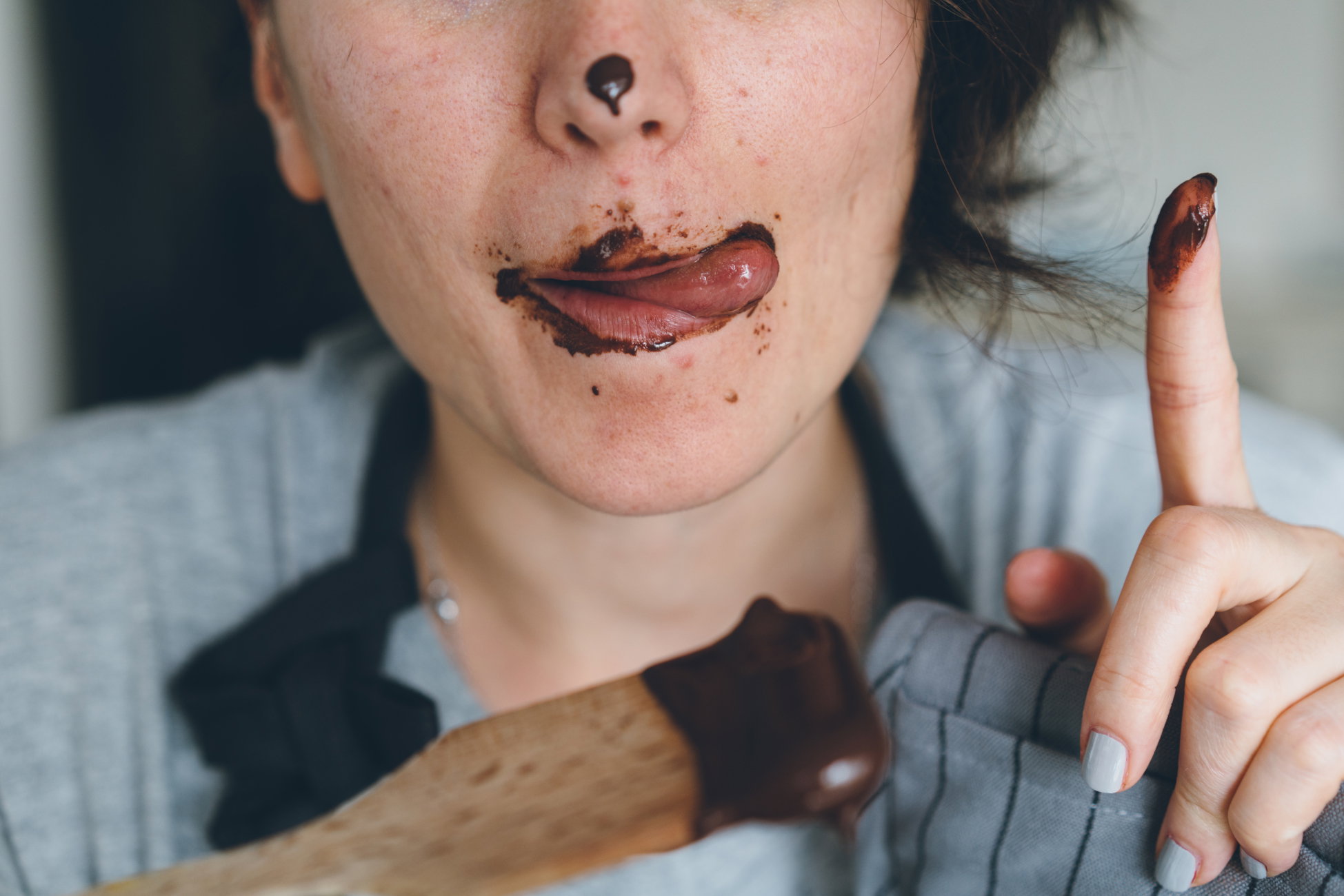 Woman eating chocolate