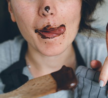 Woman eating chocolate