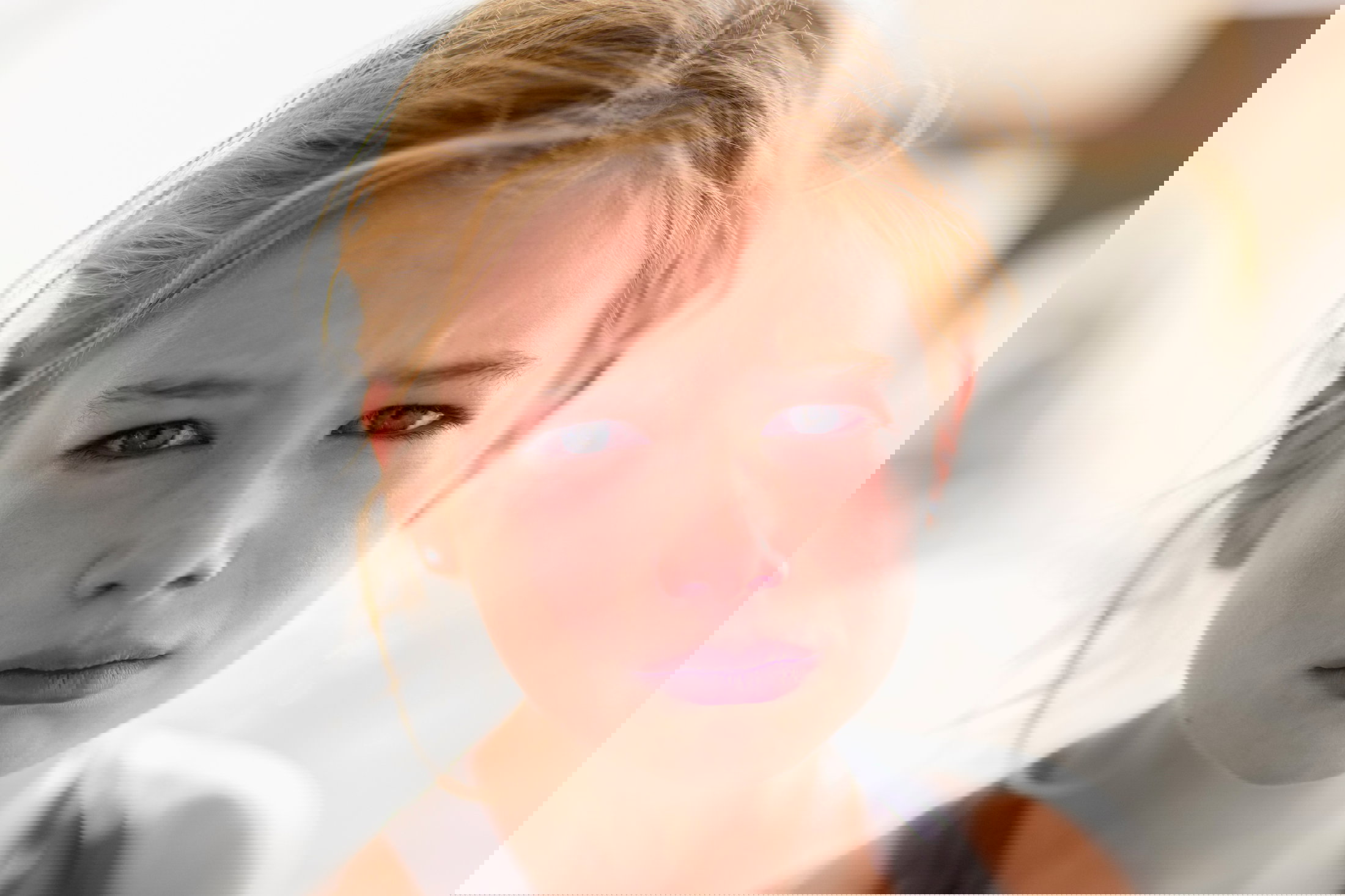 Close up of red face of crying Caucasian girl