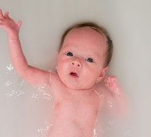 Baby taking a bath