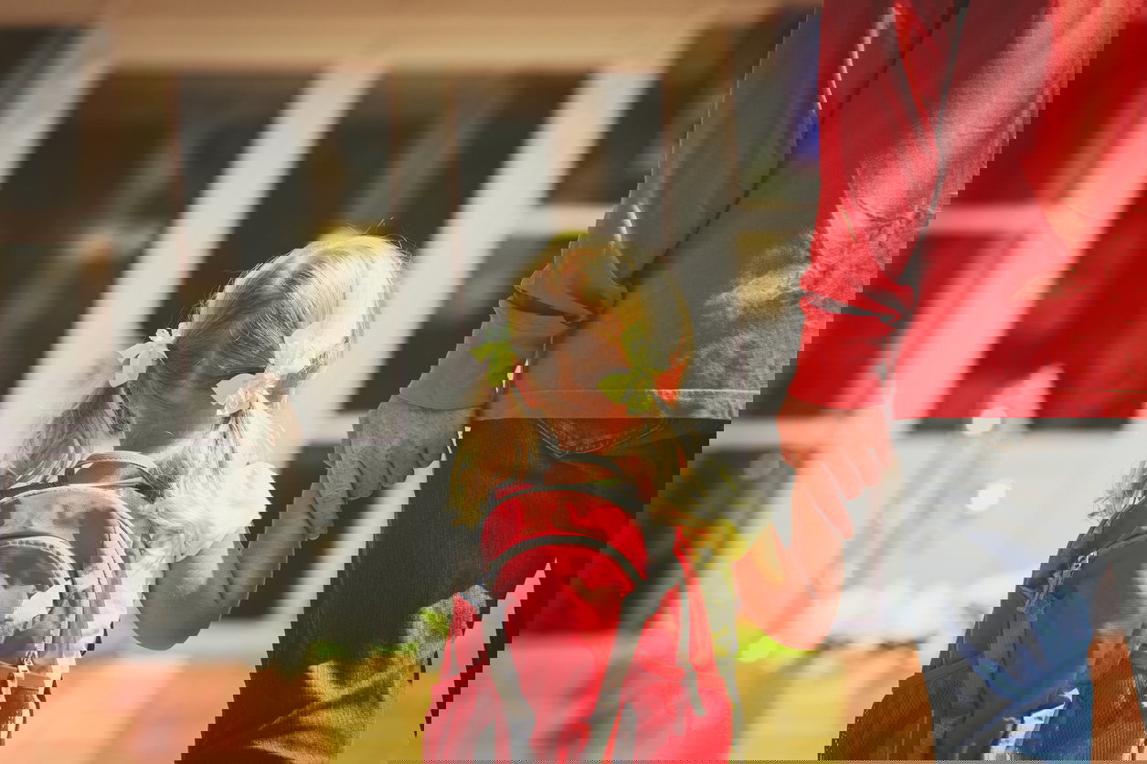 father and little daughter go to school or daycare