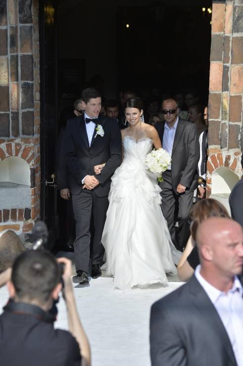 Anna Lewandowska w sukni ślubnej projektu Macieja Zienia