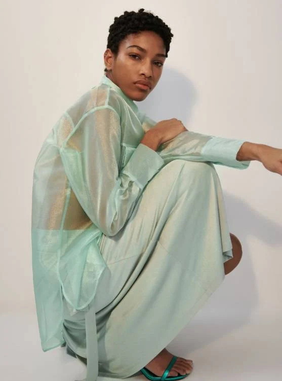 Miętowa bluzka Reserved z wyprzedaży