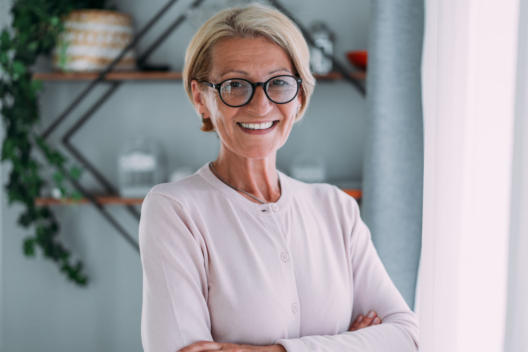 Portrait of happy woman at home.