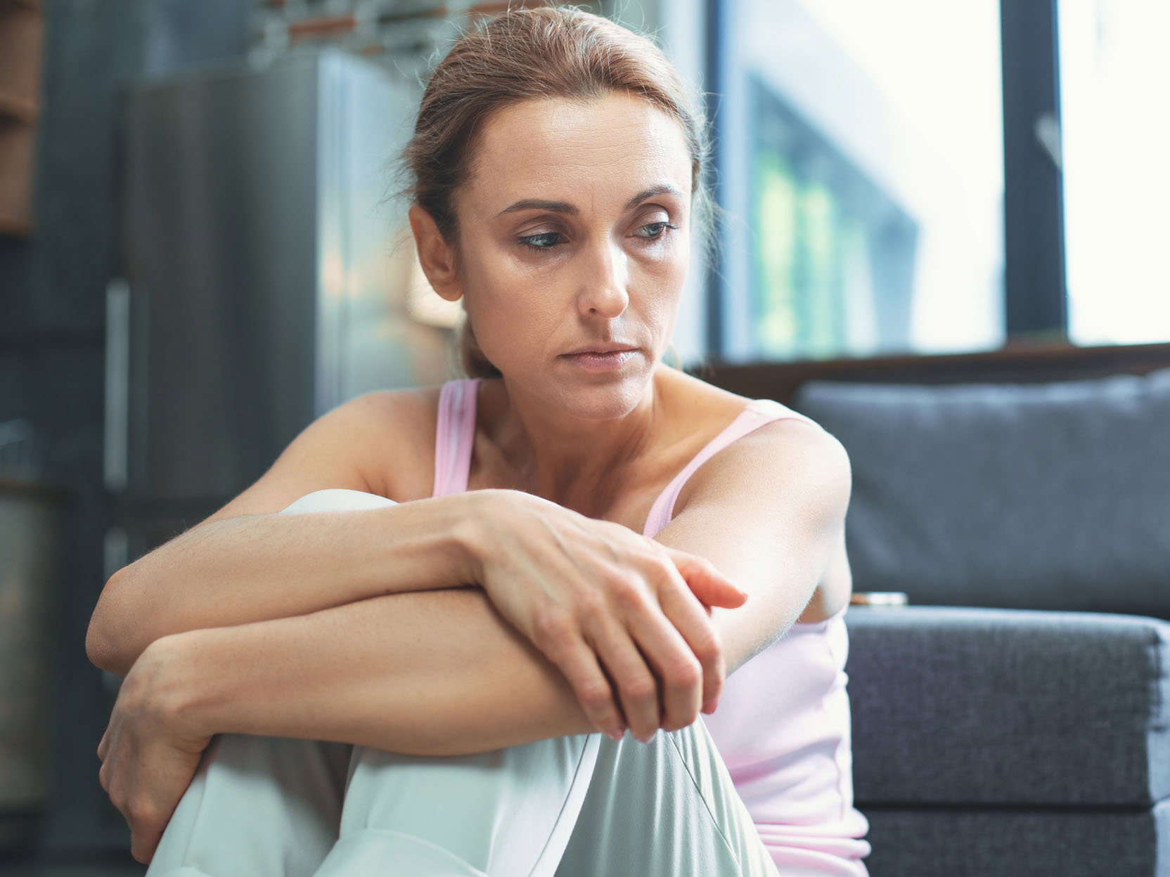 Pleasant mature woman acting hopeless