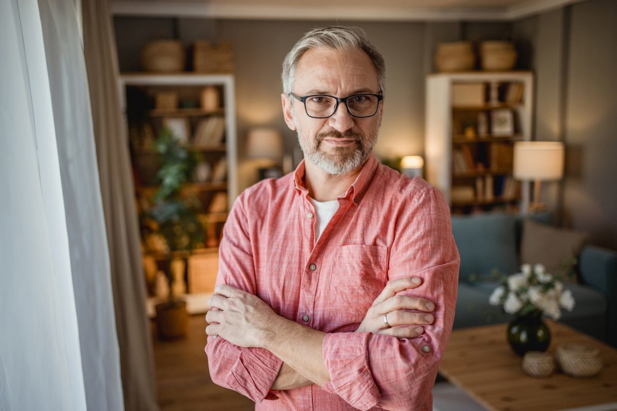 Portrait of a mature man in the living room
