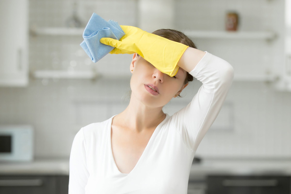 Woman, frustrated with work about the house