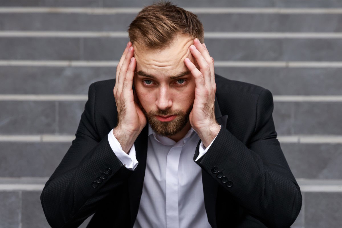smutny mężczyzna iStock by Getty Images, Ivan Kyryk