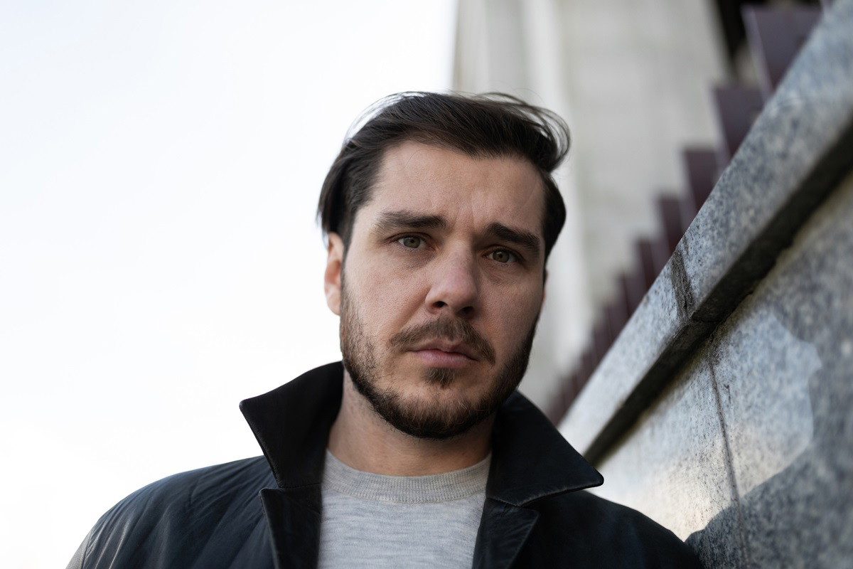 portrait of tired depressed man outside