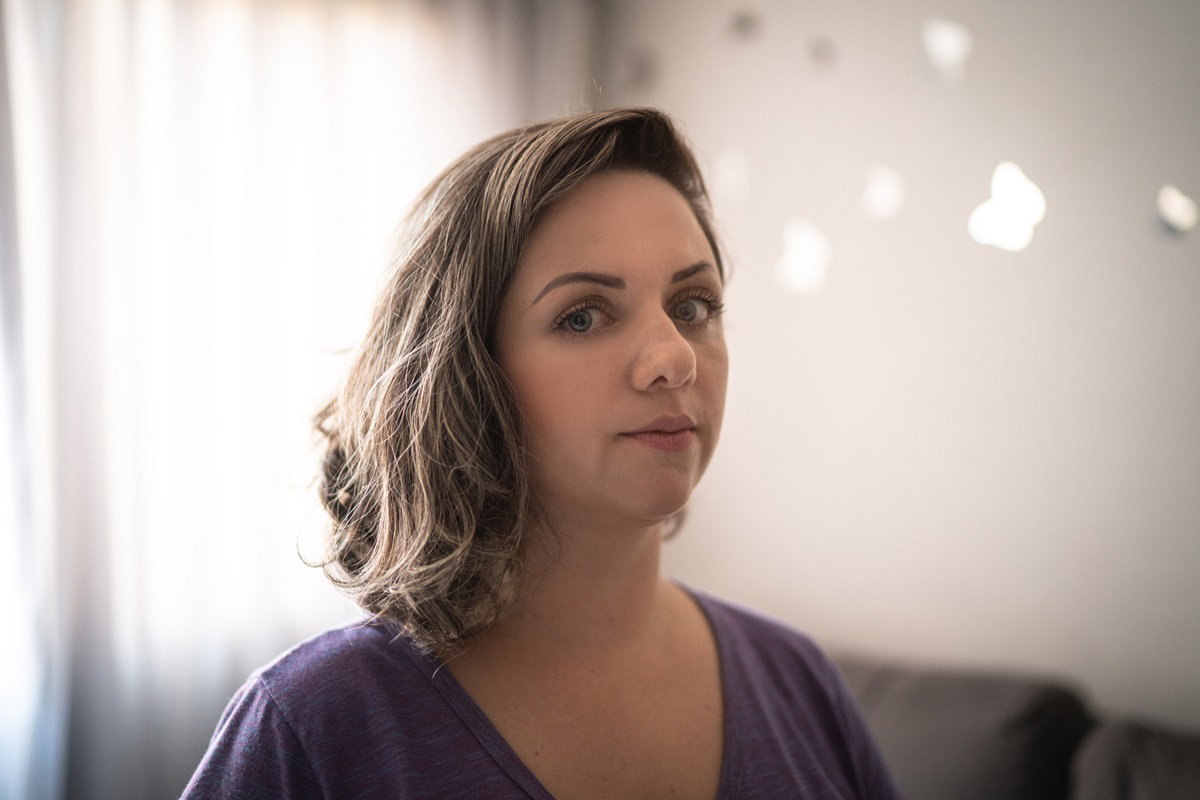 Portrait of a serious mid adult woman at home