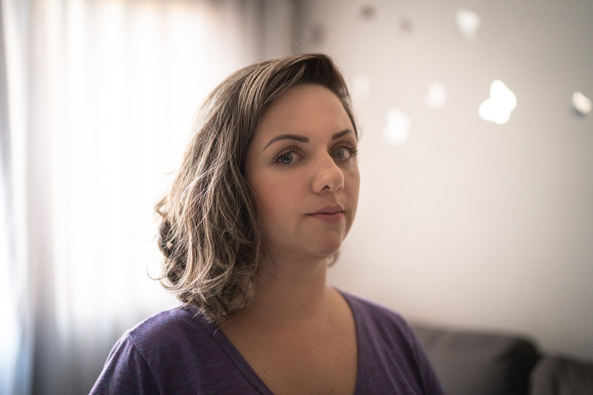 Portrait of a serious mid adult woman at home