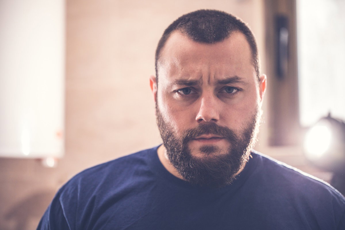Bearded man furious