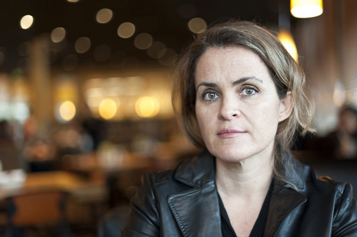 A middle aged women who is concerned