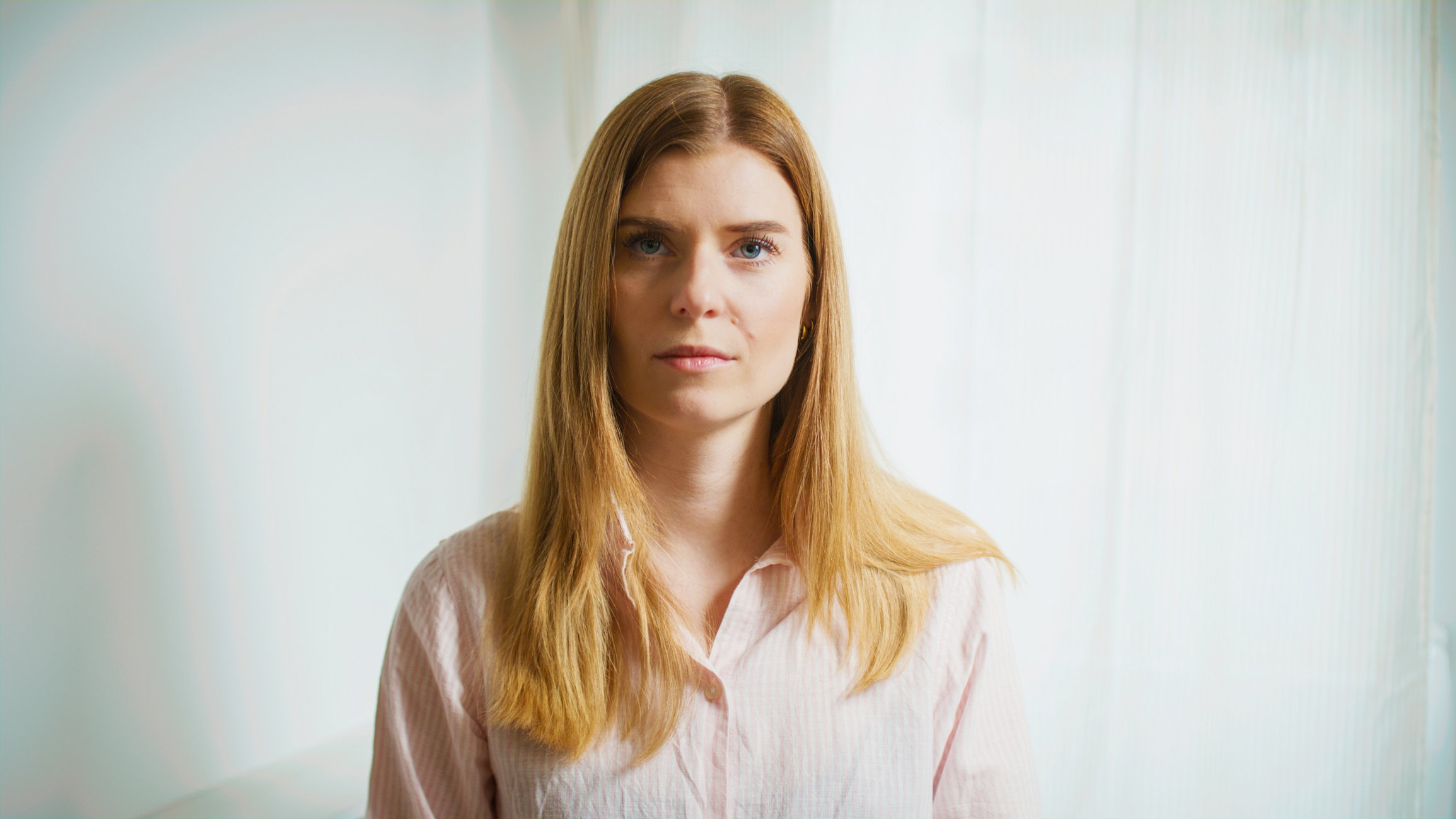 Woman in sadness and worry. (studio  shot)