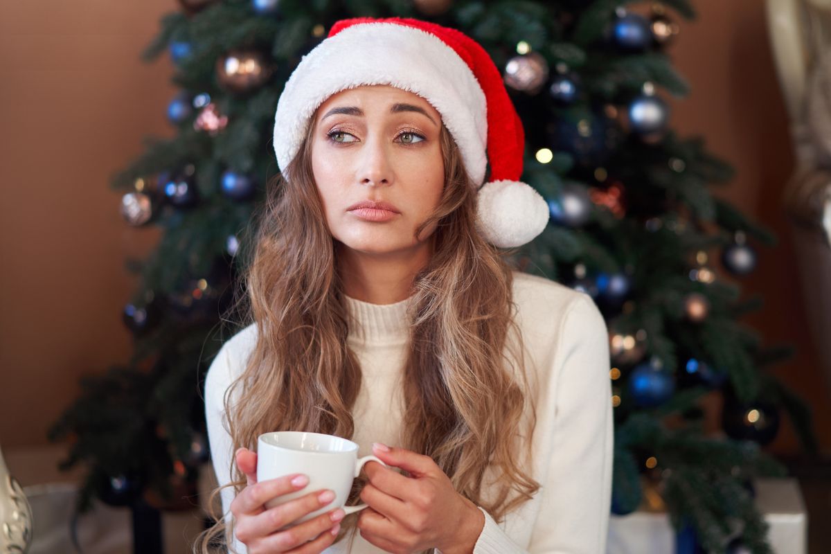 Boże Narodzenie, kobieta zamyślona i smutna