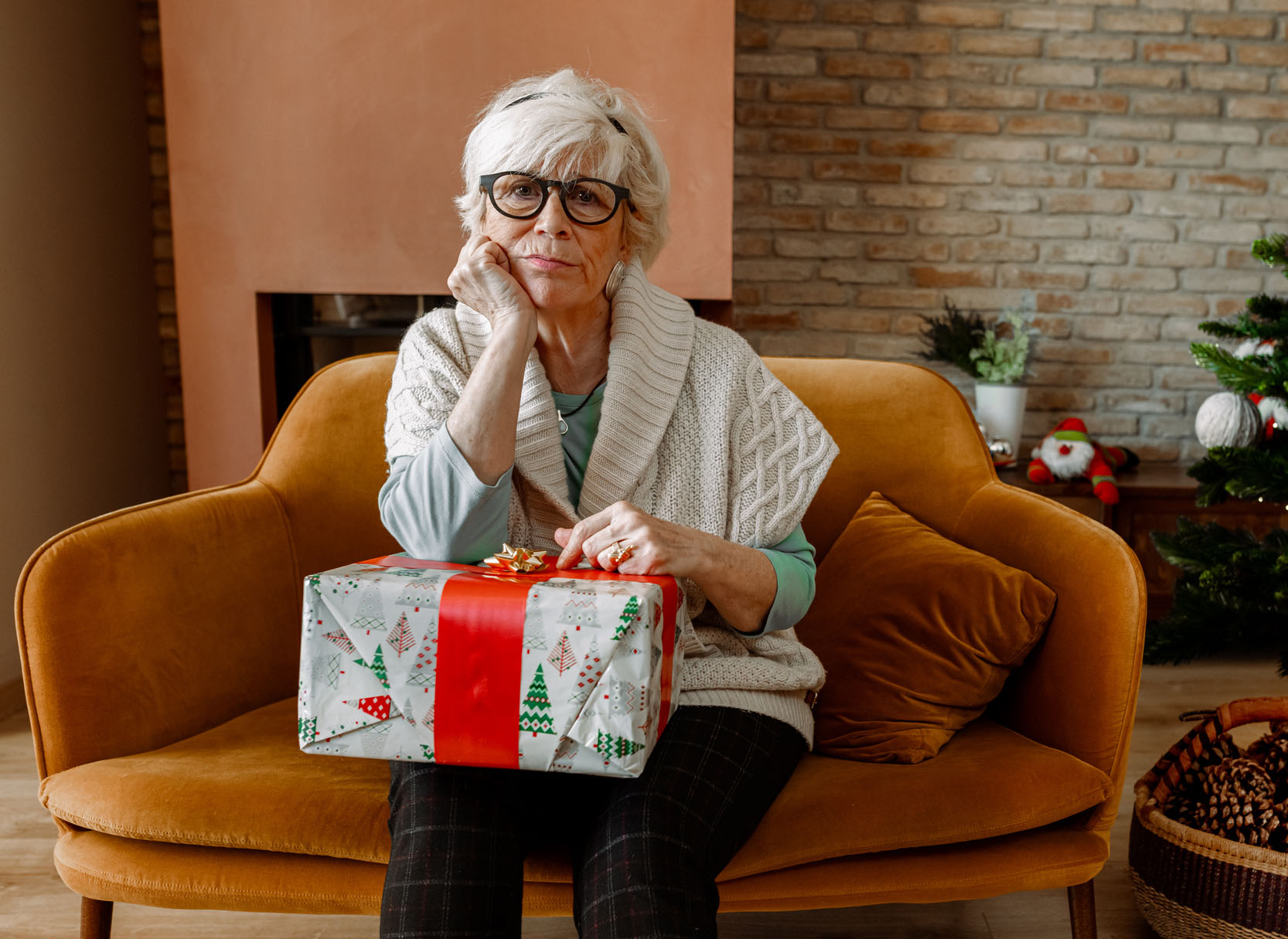 Elderly woman sad and alone at Christmas.