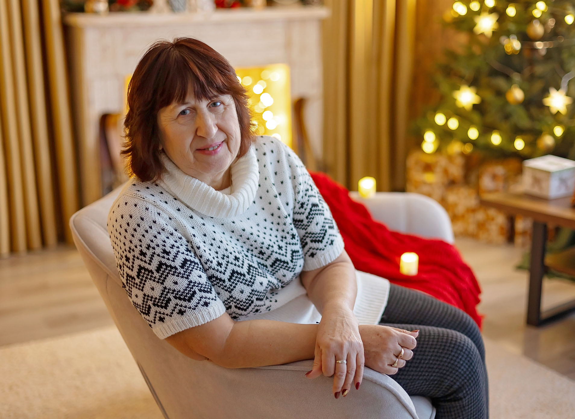 Happy family on Christmas, enjoying some quality time together, kids and adults with pet dog on Christmas eve