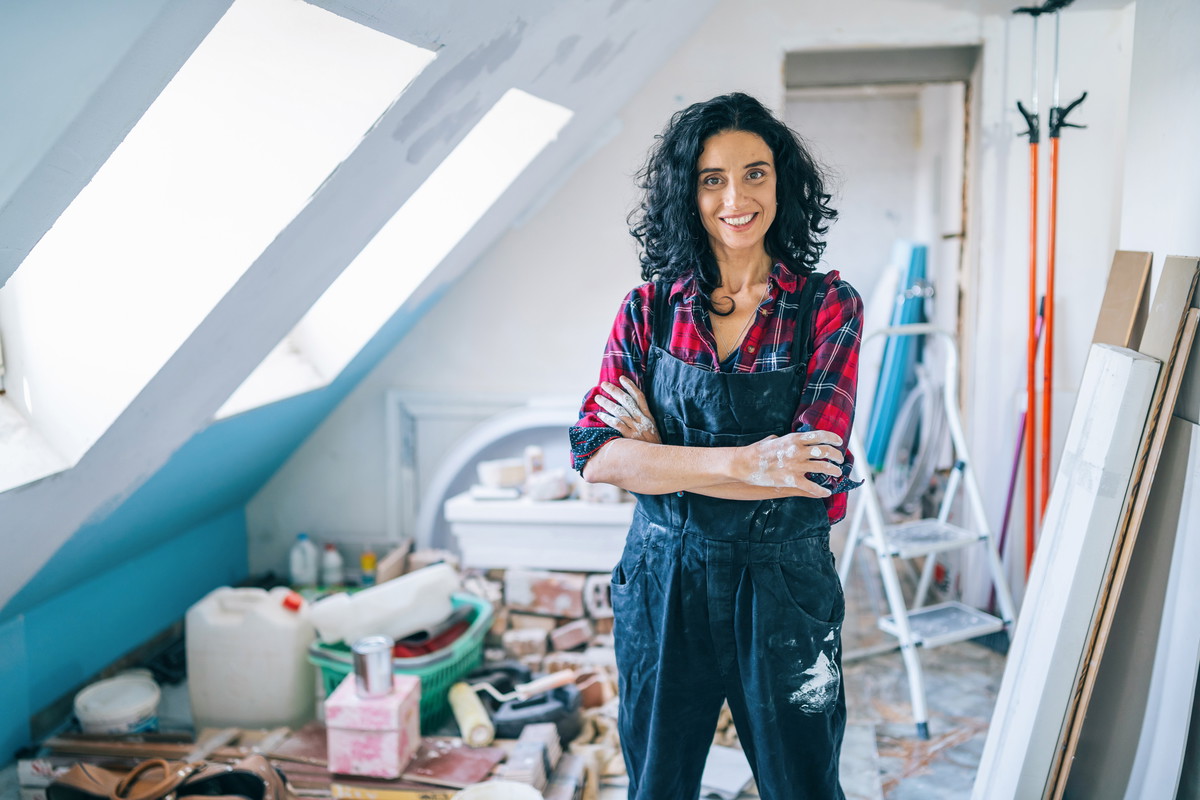 Mid adult women enjoying home renovation