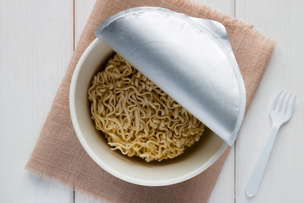instant noodles in a box on a white background