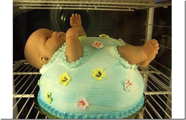 Tort na baby shower z głową dziecka