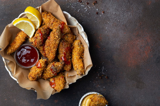 crispy Chicken strips with various dipping sauces
