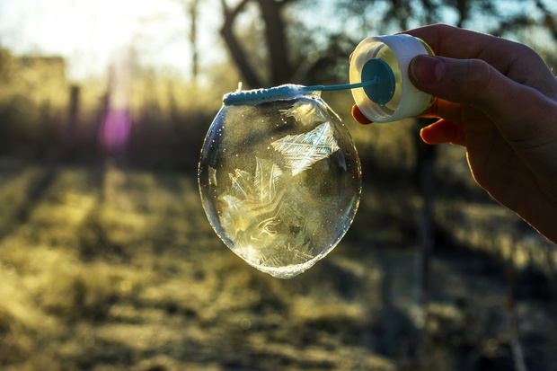 soap bubble is freezing in a cold