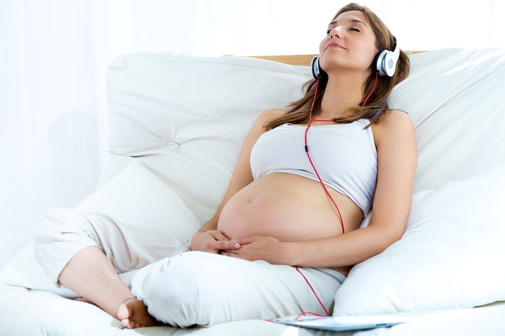 Pregnant listening to music