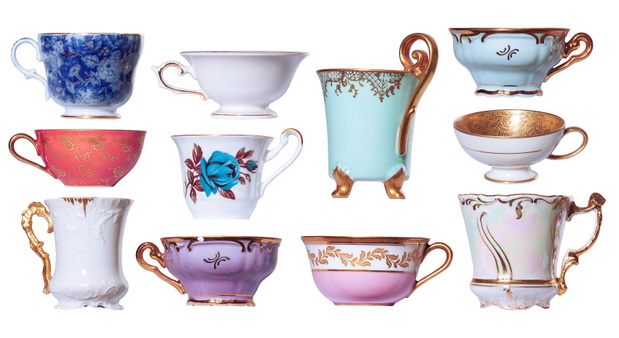 set of vintage granny's, antique tea, coffee cups with gold rim, isolated on white background