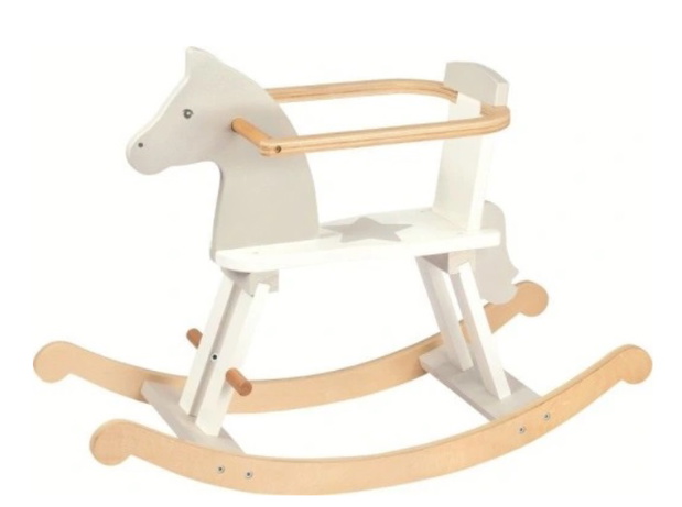 Baby boy playing with wooden toys lying on the Mat. Ecology, education, upbringing concept