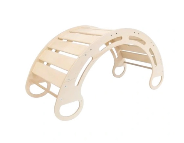 Baby boy playing with wooden toys lying on the Mat. Ecology, education, upbringing concept