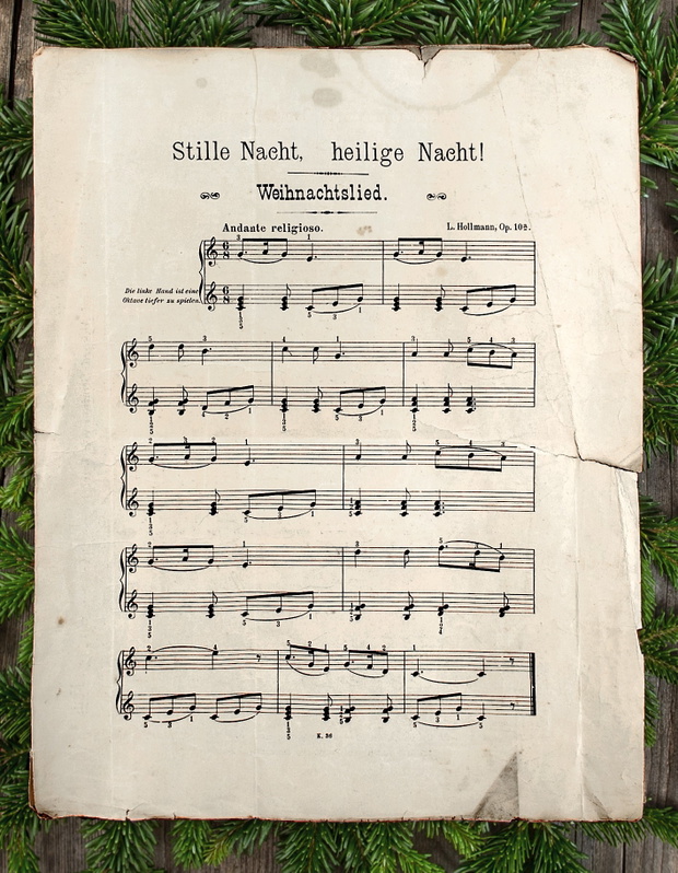 Old paper sheet over wooden background