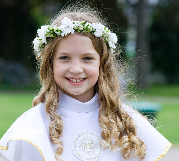 First Communion - smiling girl