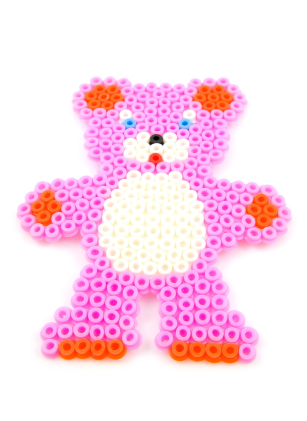 bead arts in shape of bear over white background