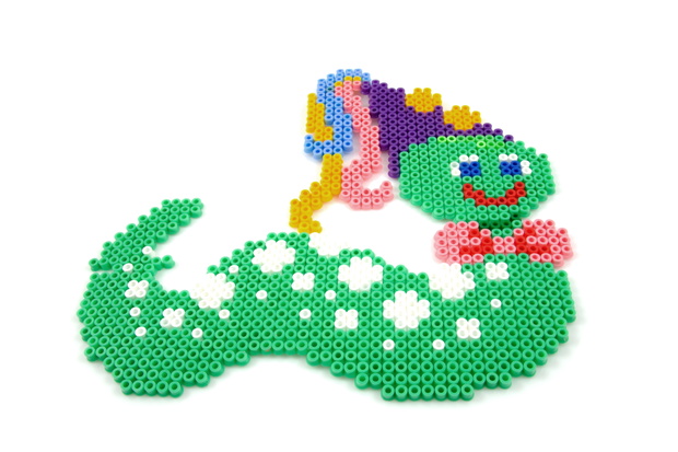Bead arts in the shap of animal over white background