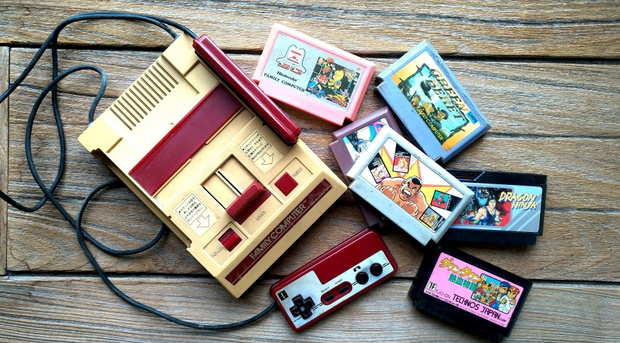 Old Nintendo Entertainment System Family Computer and game cartr