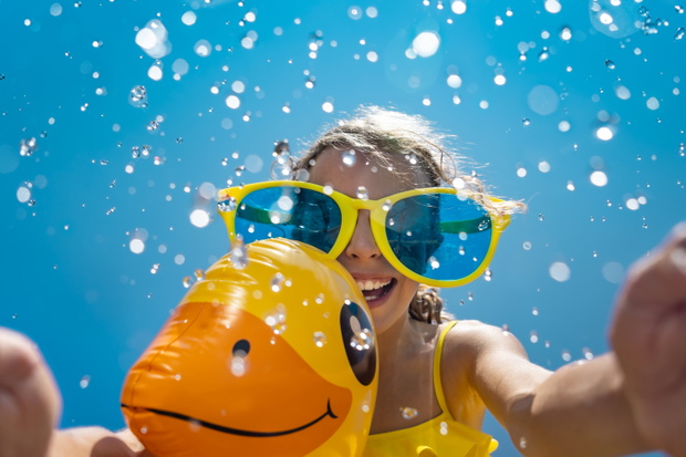 Spring break! Happy child having fun on summer vacation