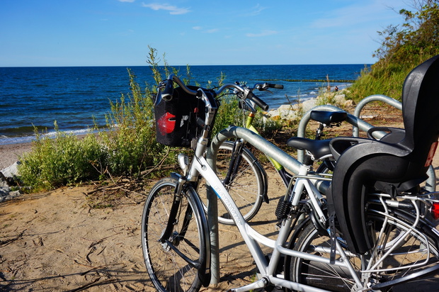 SARBINOWO, POLAND - Aug 02, 2016: Locked bicycles on the beach in Sarbinowo, Poland