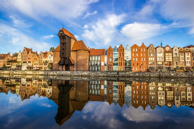 Amazing sunrise. Old town of Gdansk at Motlawa river, Poland