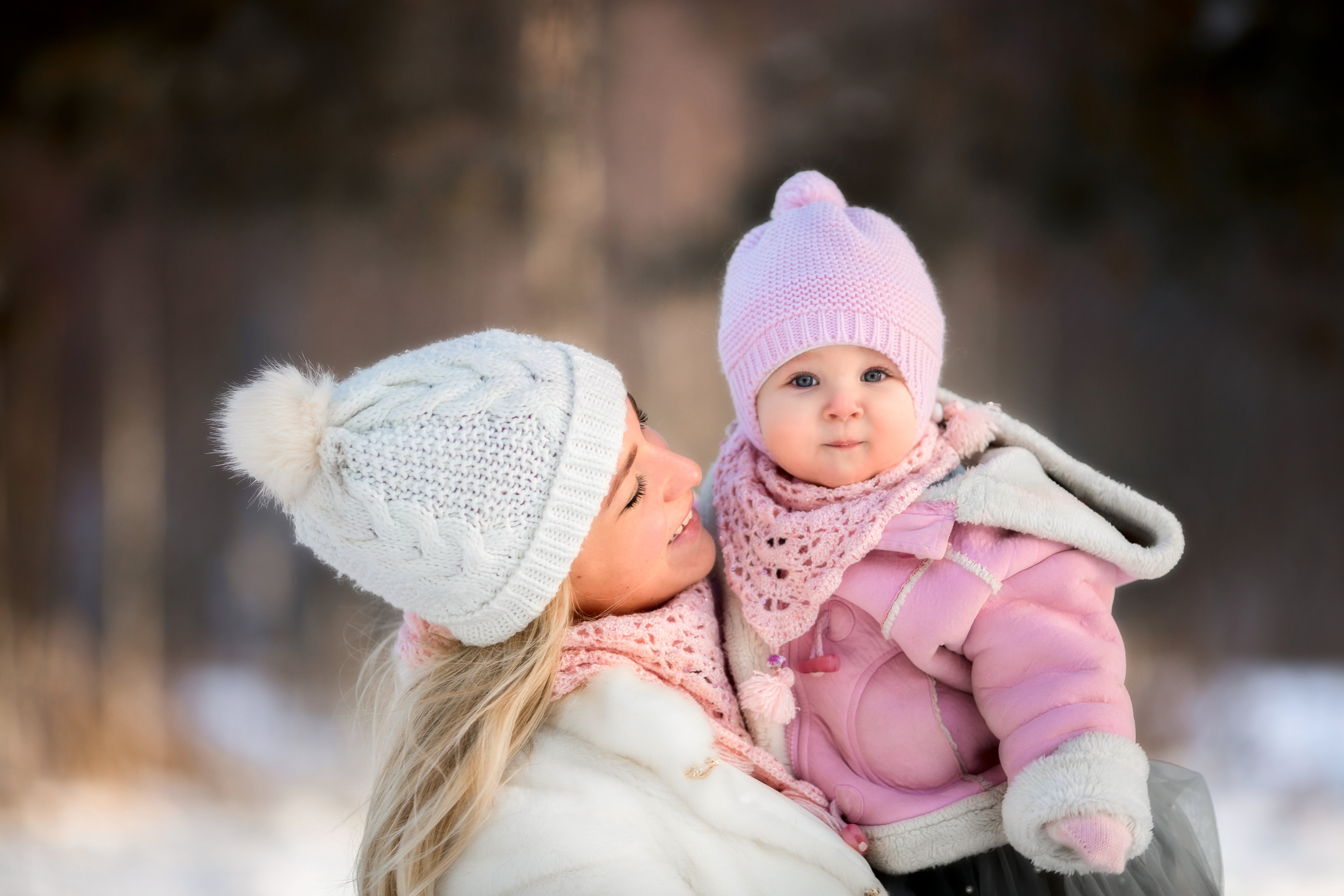 Beautiful Mother and daughter winter portrait